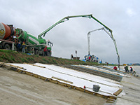 Бетонирование откосов дамбы Рижской ГЭС (Латвия) с использованием добавки в бетон ЛАХТА® КМД